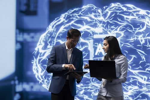 Two IT specialists discussing security reports