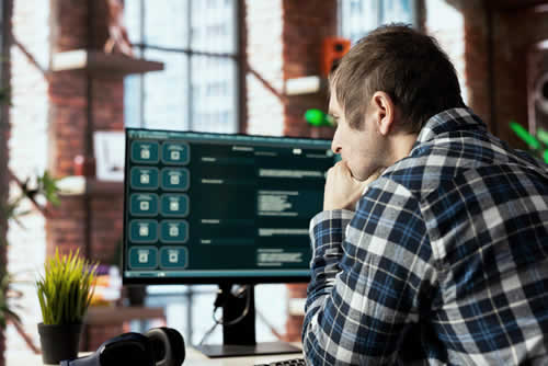 IT worker keeping an eye on reports