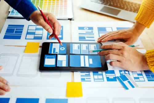 Website page design team at work