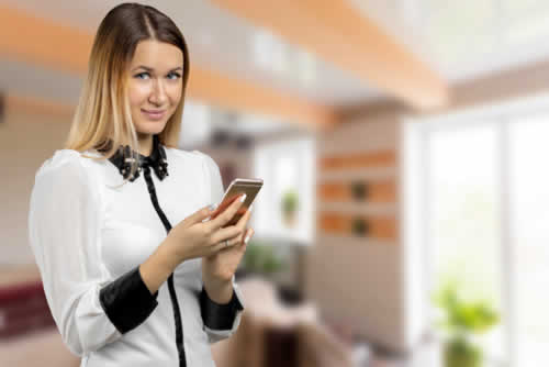 Hospitality worker training on mobile phone