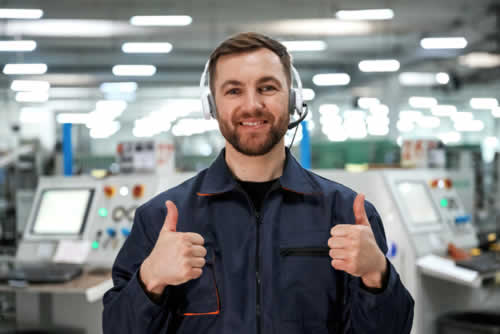 Technical specialist giving thumbs up