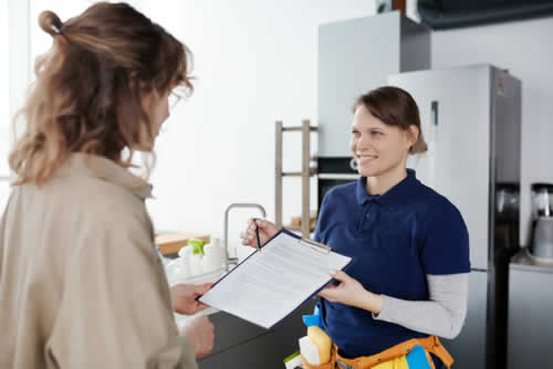 Employer talking to household staff