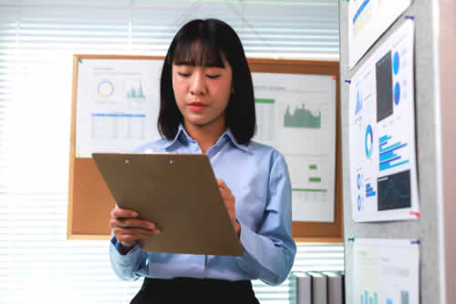 Manager looking at activity report