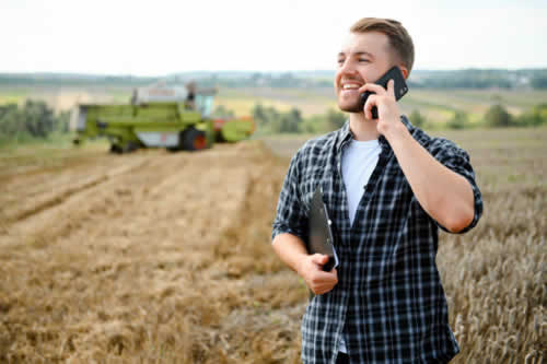 Farmer using a telephone