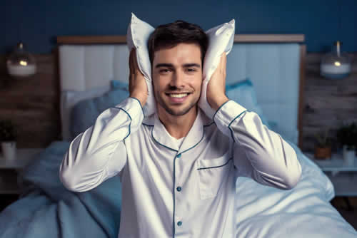 Man making sure he has good sleep levels