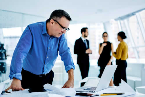Manager reviewing staff activity