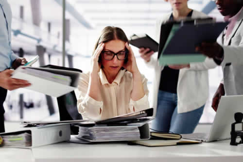 Stressed office worker trying to stay calm