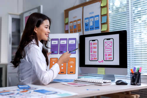 Marketing executive working with design templates
