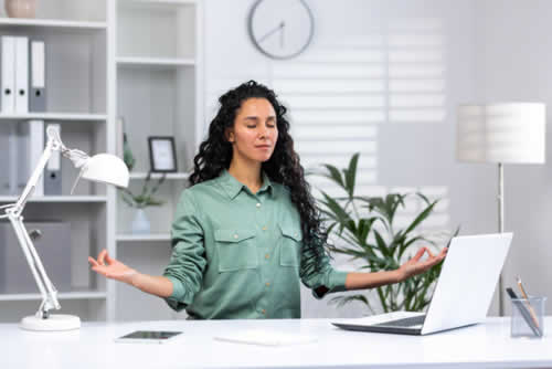 Slow breathing exercise at a desk