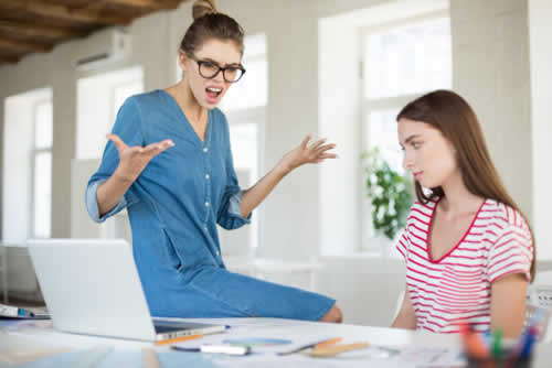 Manager shouting at an employee