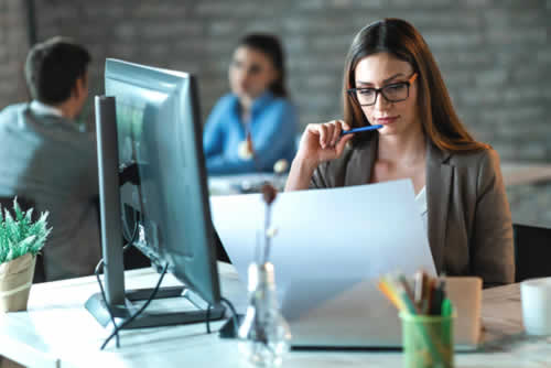 Office worker looking at security procedures