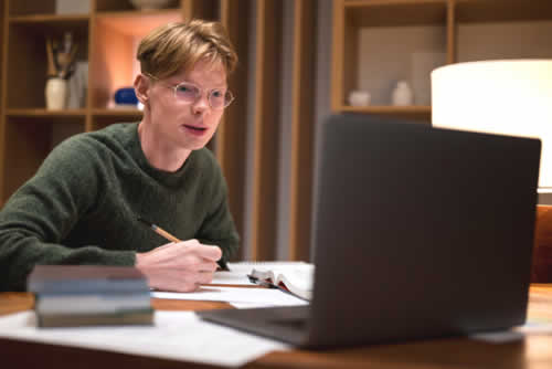 Student doing a practice test in a quiet room