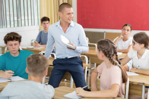 Teacher leading a class of students
