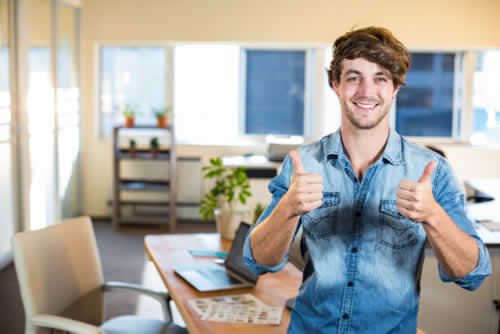 Business man with thumbs up