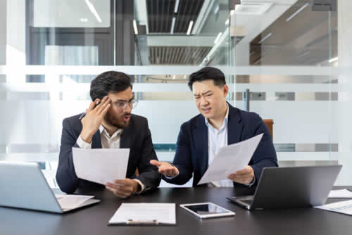 Managers reviewing the performance of an IT services provider