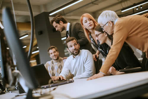 IT team working together in a review session