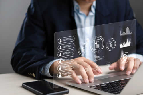 HR hiring manager reviewing multiple CVs
