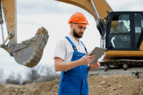 Site manager evaluating machinery repair decisions